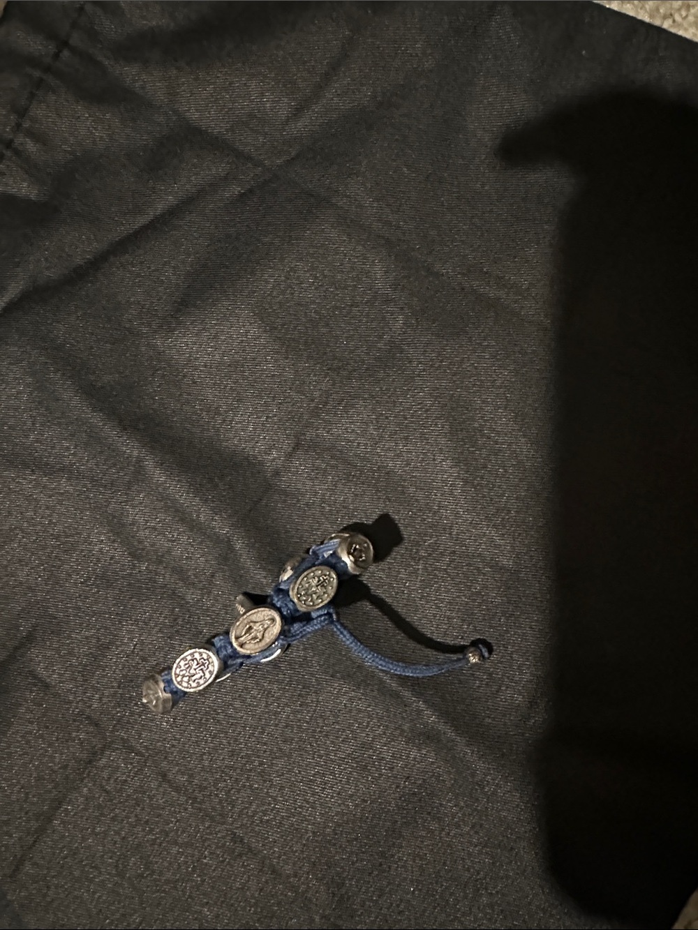 Adjustable Blue Cord Bracelet with Silver Tone Medallions
